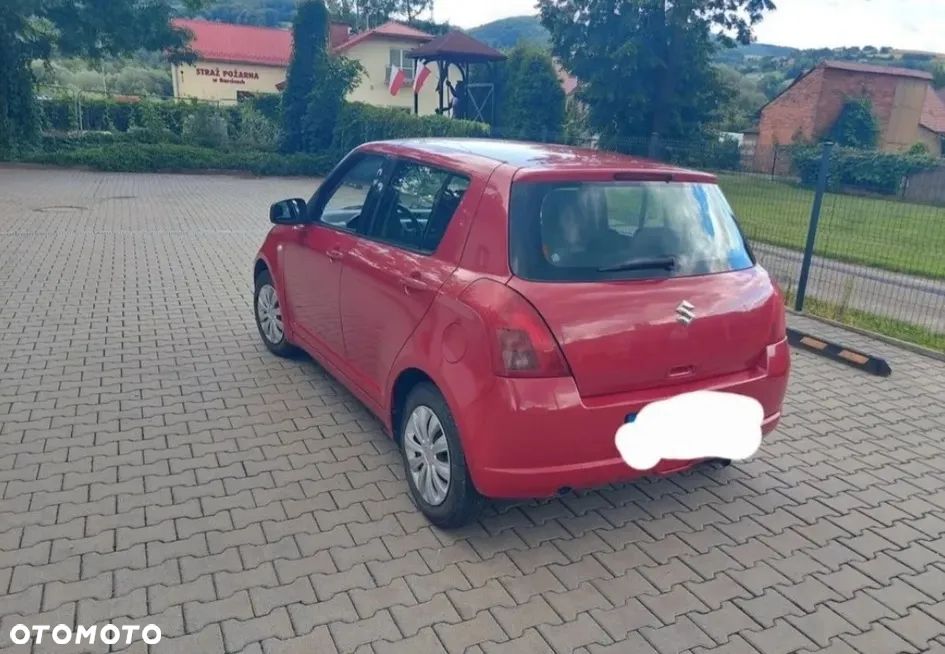 Suzuki Swift 1.3 Club - 3