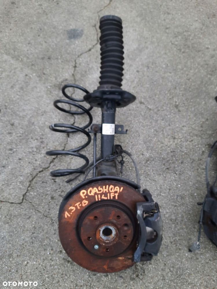 zwrotnica amortyzator nissan qashqai ii lift 1.3 - 1