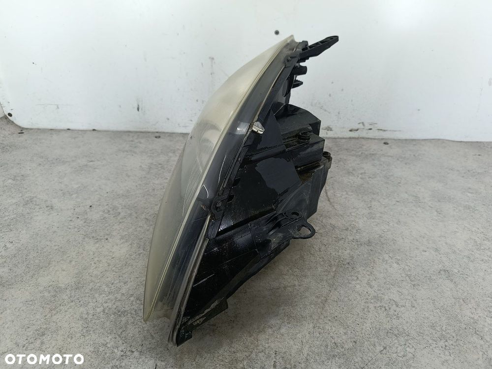 LAMPA PRZÓD PRAWA XENON OPEL ZAFIRA B 13252471 13153357 0301214282  AL  GM - 5