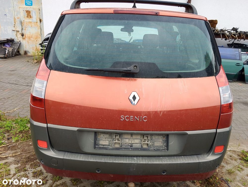 Renault Megane Grand Scenic II (03-06r.) 2.0B 134KM. Silnik F4R 770 ; F4R 771  Skrzynia ND0 015  Lakier TEB76 .Cały na części. GWARANCJA !!!  Przód Tył Zestaw Komplet Drzwi Klapa Zderzak Błotnik Maska Grill Atrapa Szyba Pas Lampa Lusterko Boczki Fotel Kanapa Kokpit Deska Rozdzielcza Przełącznik Włącznik Sterownik Przewody Wiązka Instalacja Moduł Komputer Czujnik Listwa Pompa Alternator Wtryski Głowica Rozrusznik Kompresor Sprzęgło Dwumas Silnik Skrzynia ABS Klimatyzacji Paliwa Wspomagania Kolektor Turbina Przepustnica Zawór Chłodnica Koło Hak Belka Sanki Zawieszenie Mcpherson Półoś Amortyzator Wydech Tłumik Zacisk Most - 3