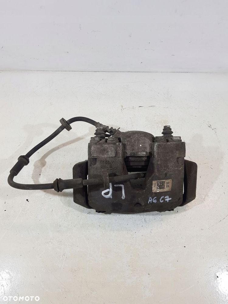 zacisk hamulcowy lewy przód audi a6 c7 2.0 tdi - 1