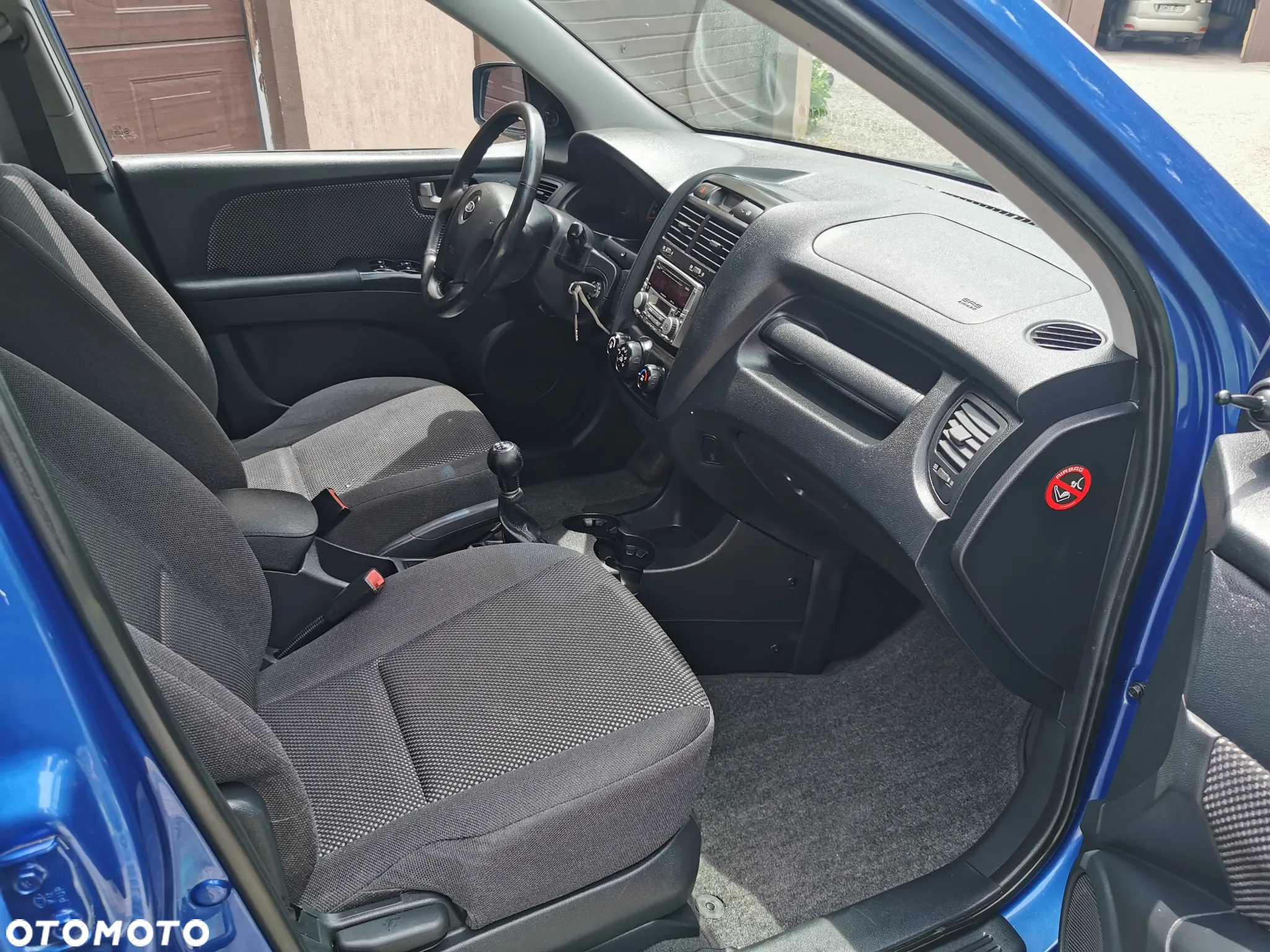 Kia Sportage 2.0 Tour + - 8