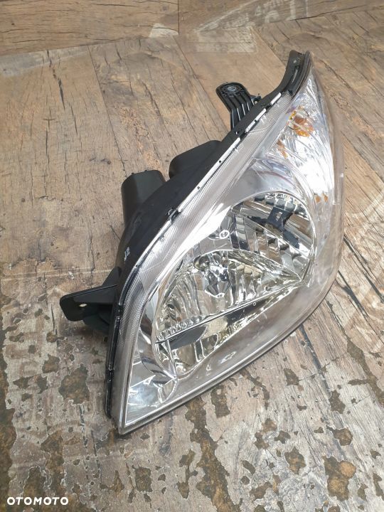 Oryginalna lampa lewa reflektor Hyundai Getz 92110-1C010 - 5