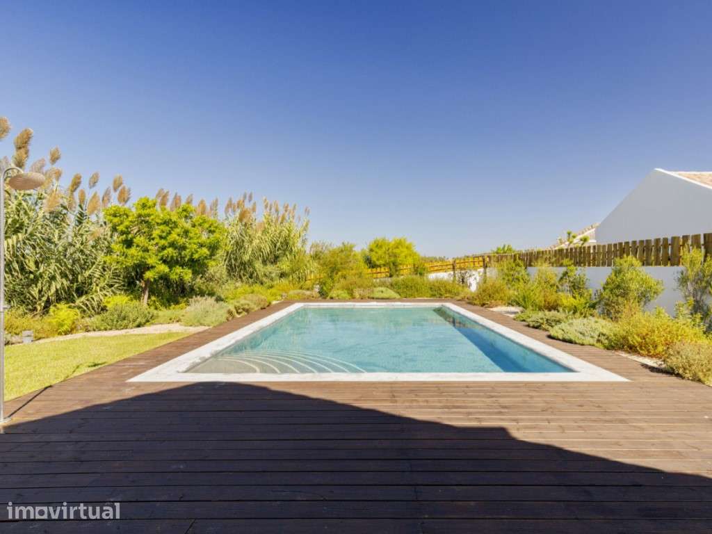 Moradia com jardim e piscina na praia do Pego - Grande imagem: 2/21