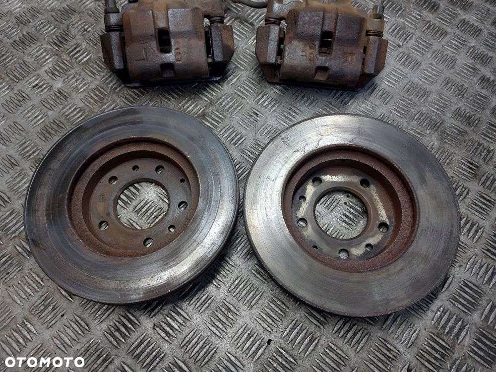 TARCZE HAMULCOWE PRZÓD + KLOCKI + ZACISKI MAZDA 626 V GF 2.0 D - 2