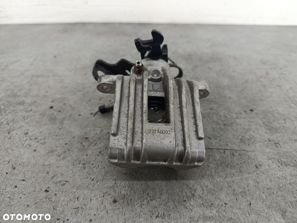 ZACISK HAMULCOWY LEWY TYŁ VW PASSAT B5 FL 1.9 TDI - 1