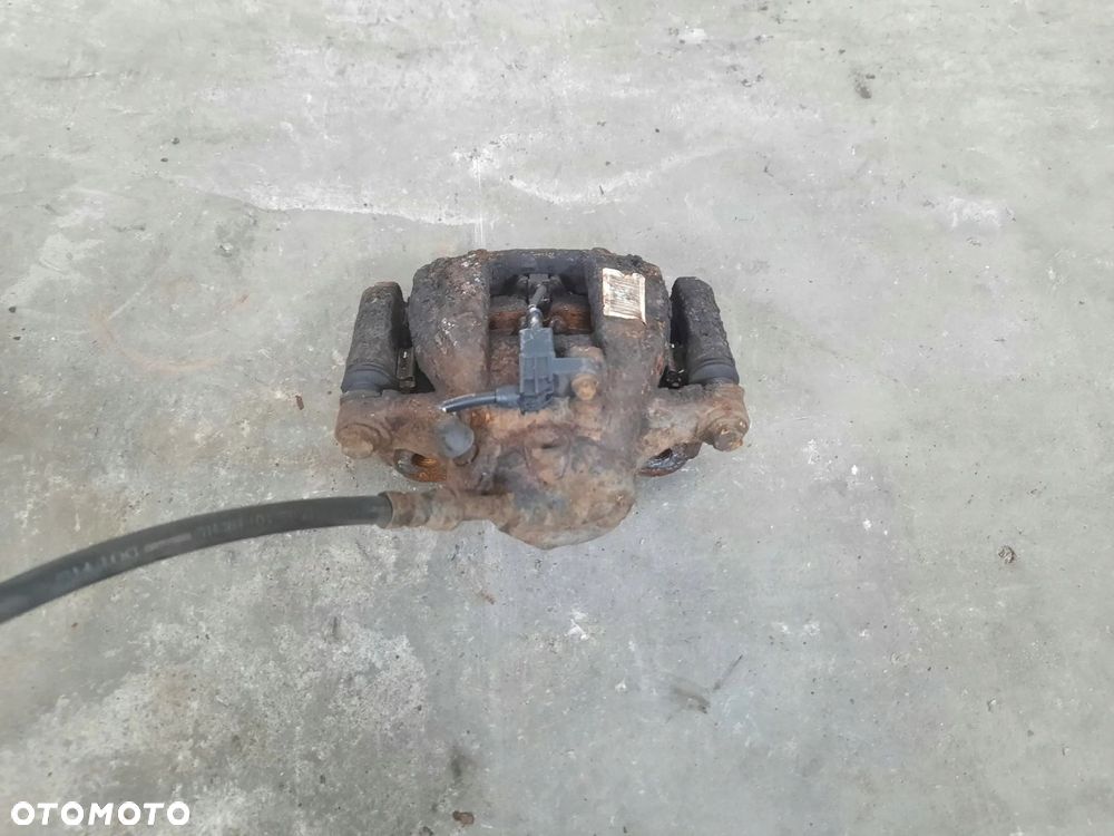 ZACISK HAMULCOWA LEWY TYŁ MERCEDES SPRINTER 906 W906 A9064231398 - 2