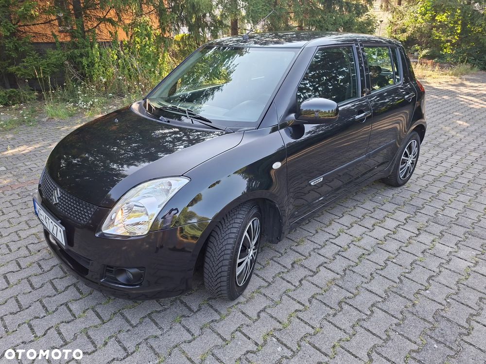 Suzuki Swift 1.5 GLX / Comfort - 10