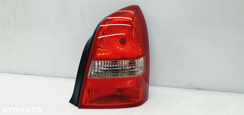 NISSAN PRIMERA P12 SEDAN LAMPA PRAWA TYŁ 02-07r ORYG EU!!! - 2