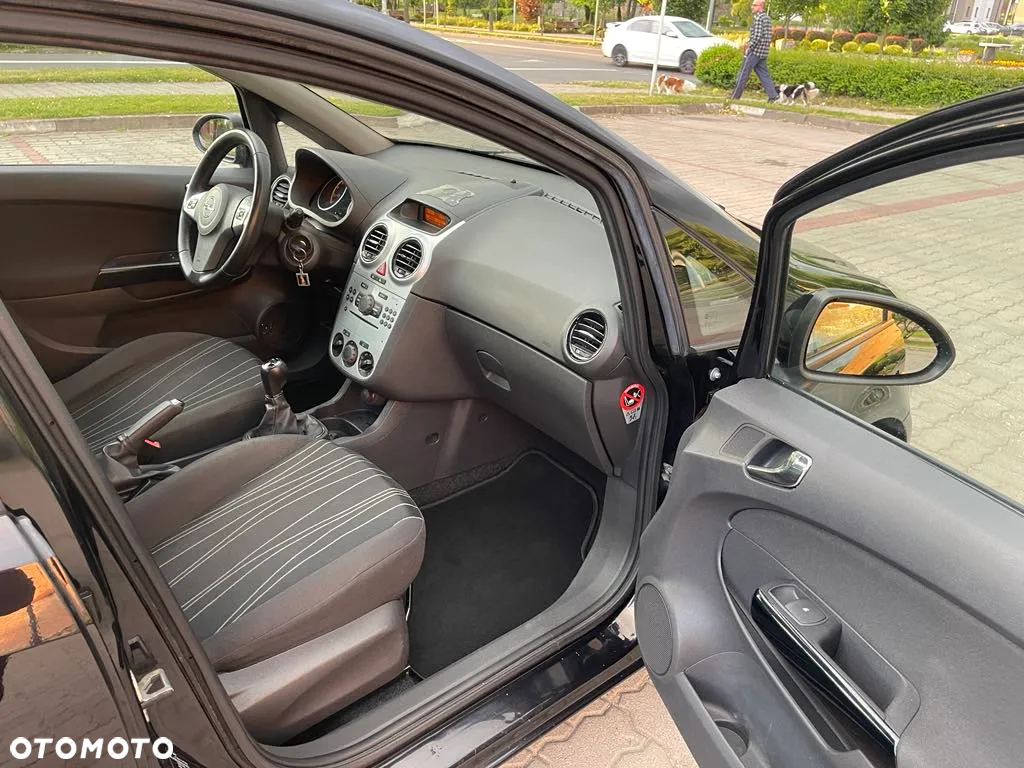 Opel Corsa 1.2 16V Enjoy - 12