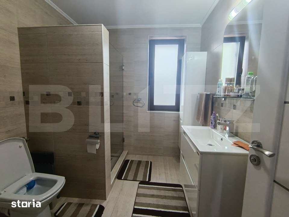 Casa cu 3 camere in suprafata de 122 mp si un teren de 500 mp - Imagine principală: 3/16