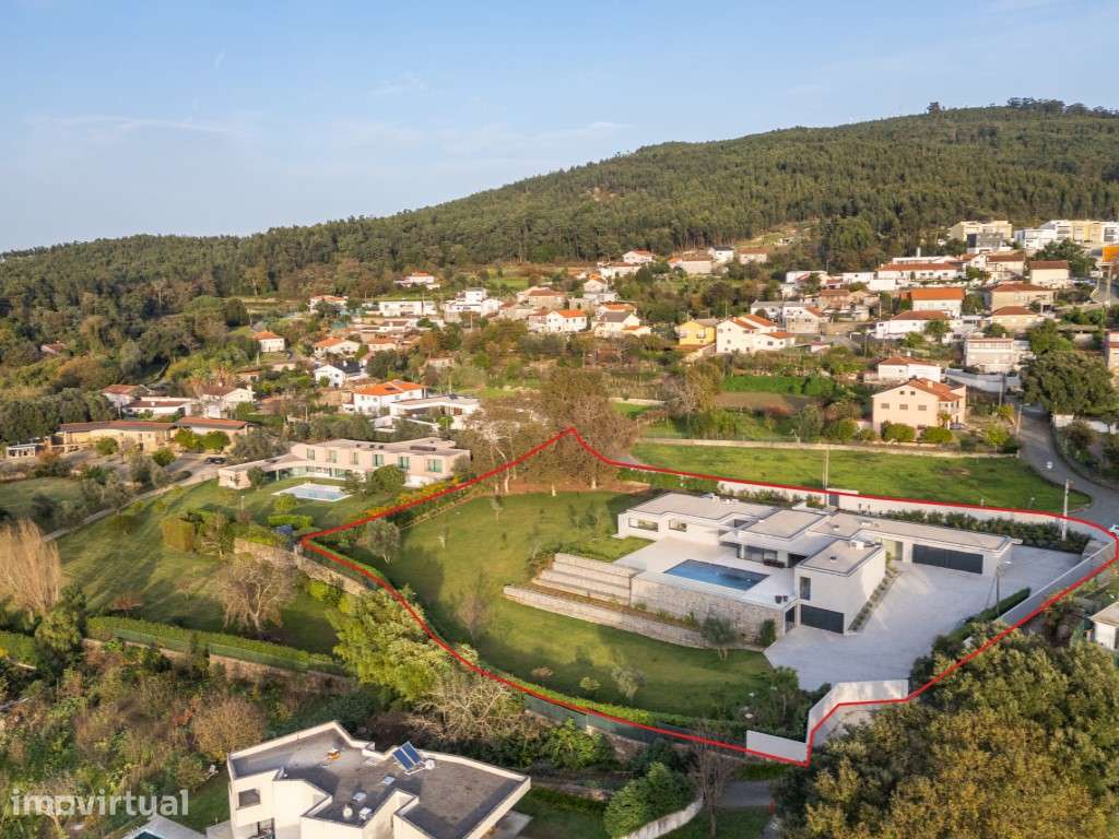 Moradia térrea V4+1 com piscina, ginásio e vistas panorâmicas sobre... - Grande imagem: 5/54