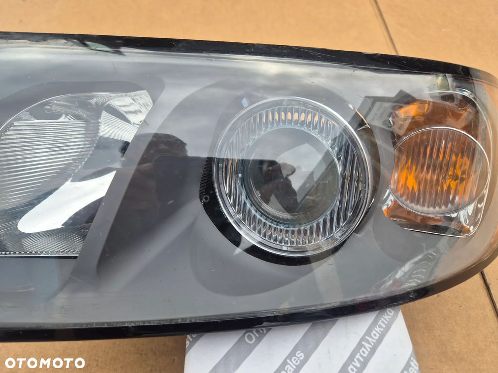 Volvo S40 V50 reflektor lewy.2003-2007.TYC.100%. - 5