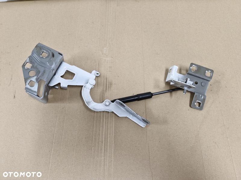 RENAULT TRAFIC III 3 VIVARO B ZAWIAS MASKI LEWY SIŁOWNIK 65401029R - 1