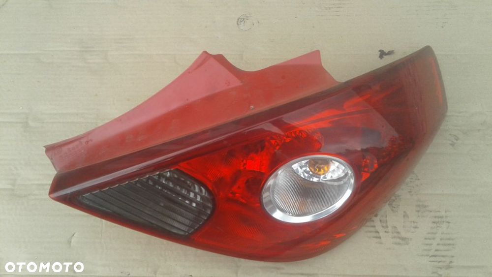 LAMPA TYLNA PRAWA OPEL CORSA D 3D - 3