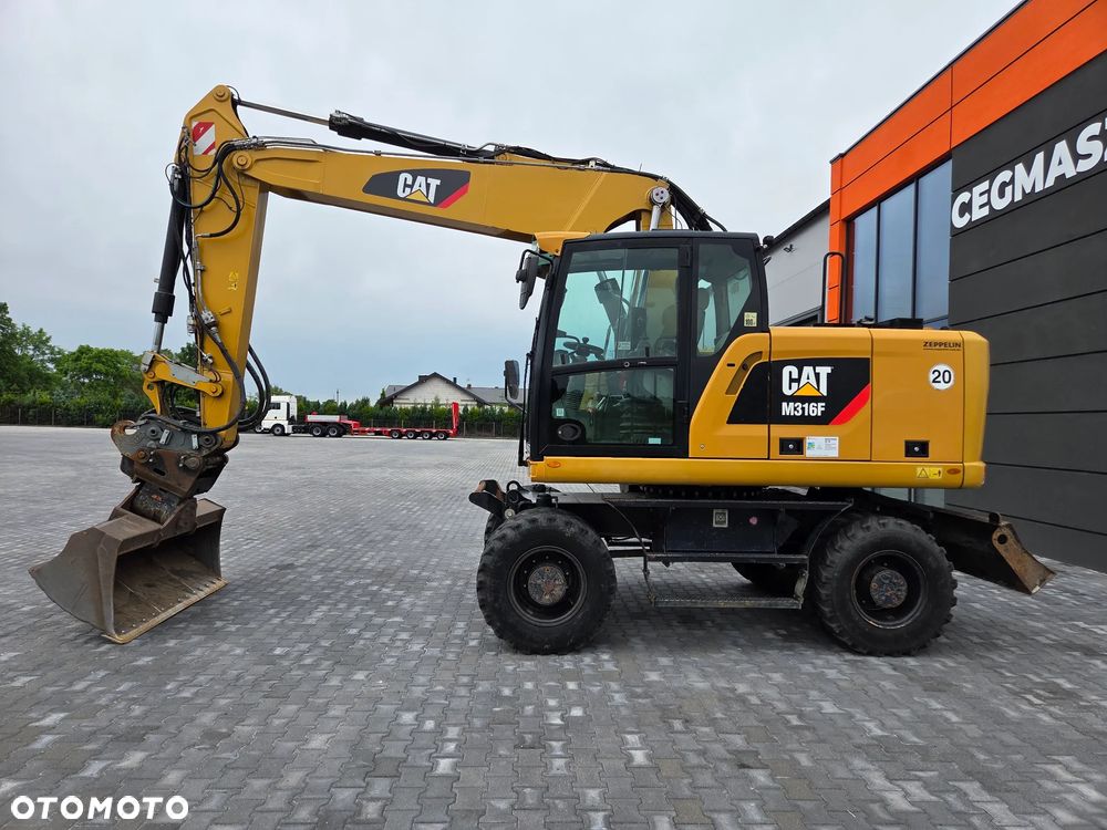Caterpillar M316F / z Niemiec / - 2