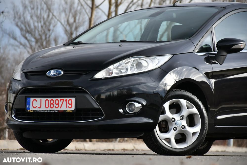 Ford Fiesta 1.4 Ghia - 11