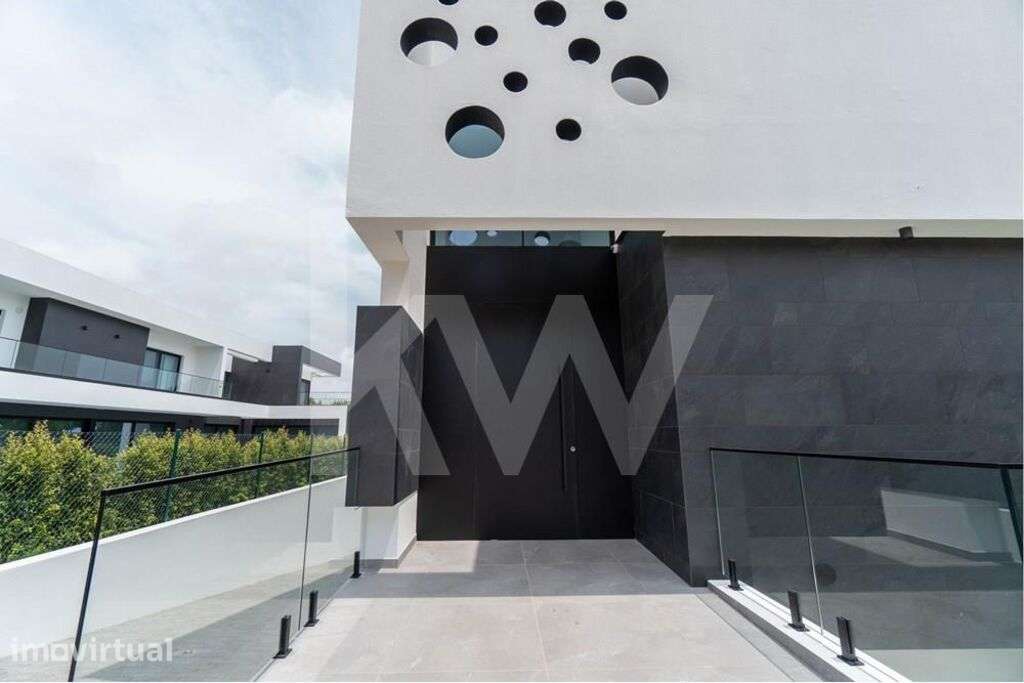 Moradia T4 nova com piscina e jardim junto do campo de Golfe em Vilamo - Grande imagem: 5/48