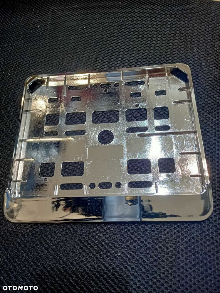 Ramka tablicy rej.  srebrna chromowana motocyklowa