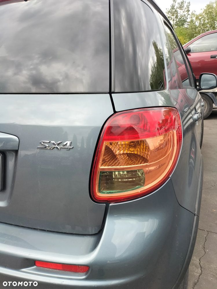 SUZUKI SX4 1.6 VVT 107KM ZY4 ZDERZAK PRZÓD KOMPLETNY KLAPA DRZWI PRAWY LEWE TYŁ PRZÓD MASKA BŁOTNIK LAMPA PAS PRZEDNI SZYBA LUSTERKO SILNIK SKRZYNIA CAŁY NA CZĘŚCI - 6