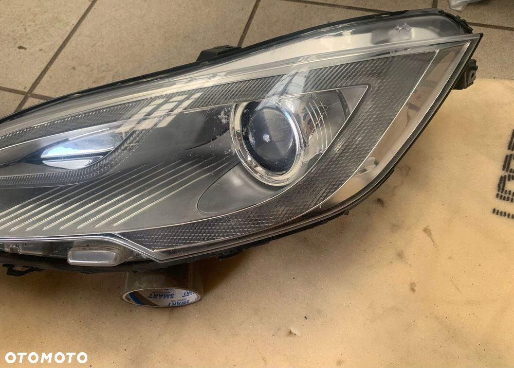 LAMPA PRZEDNIA LEWA TESLA MODEL S XENON 6005906 - 1
