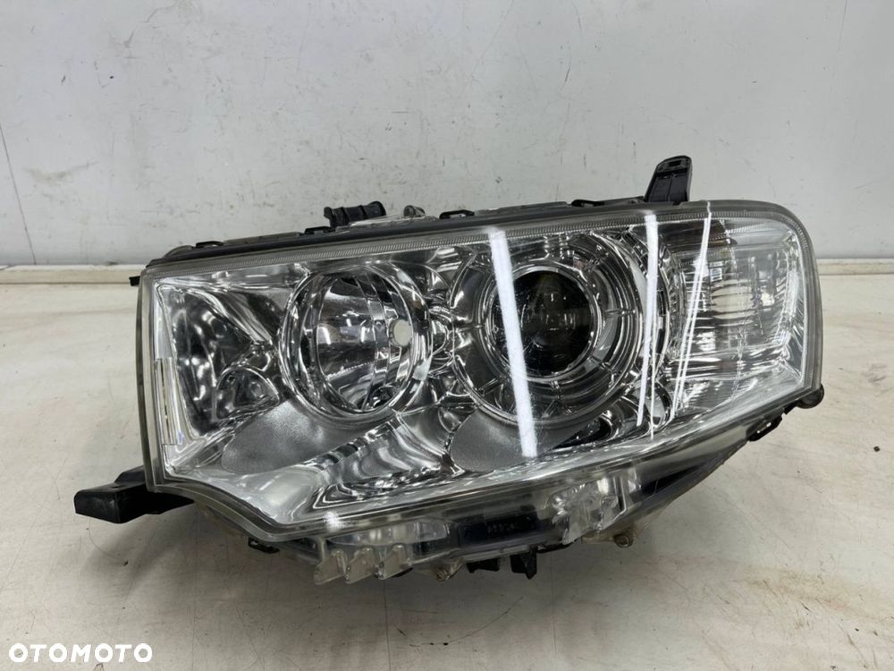 Lampa reflektor Mitsubishi L200 LIFT 10-15r. Pajero Sport II 03-16r. LEWA przednia soczewka EUROPA - 1