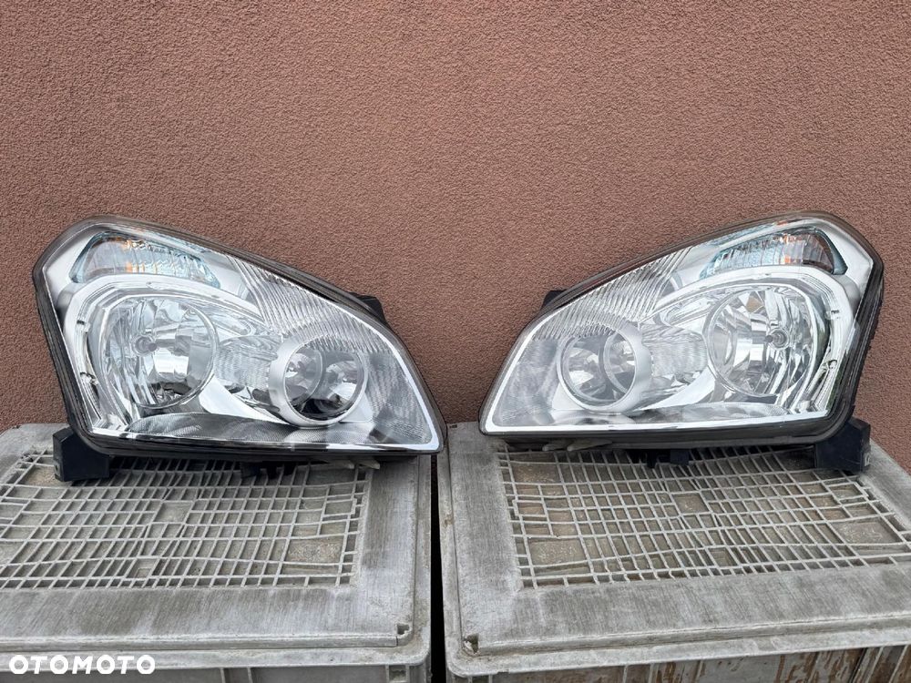 Lampa przednia NISSAN QASHQAI J10 ZWYKŁE KOMPLET EUROPA ORYGINALNE HELLA - 1