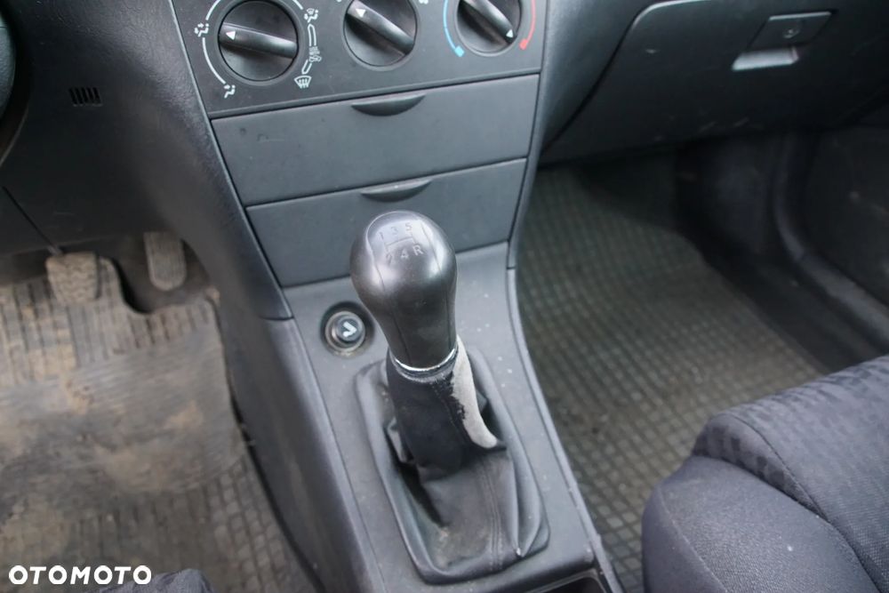 Auto na części - Toyota Corolla E12 1.4 VVT-i 97 KM 4ZZ-FE MTM 1C3 2002R Silnik Skrzynia Drzwi Maska Klapa Zderzak Błotnik Szyba Klamka Lampa Lusterko Deska Kokpit Sterownik Moduł Czujnik Licznik Panel Kierownica - 12