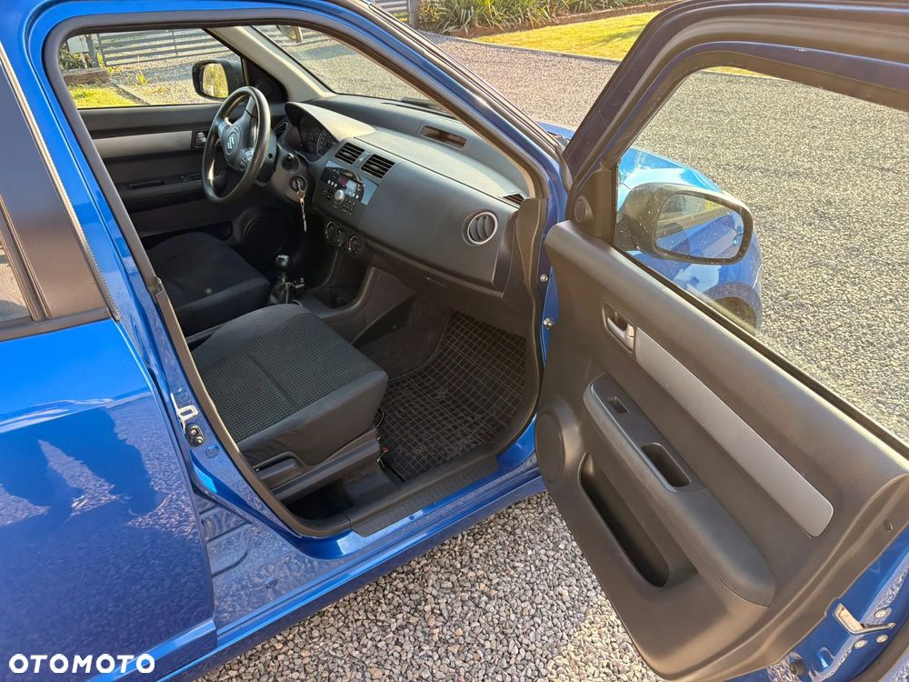 Suzuki Swift 1.3 Club - 8