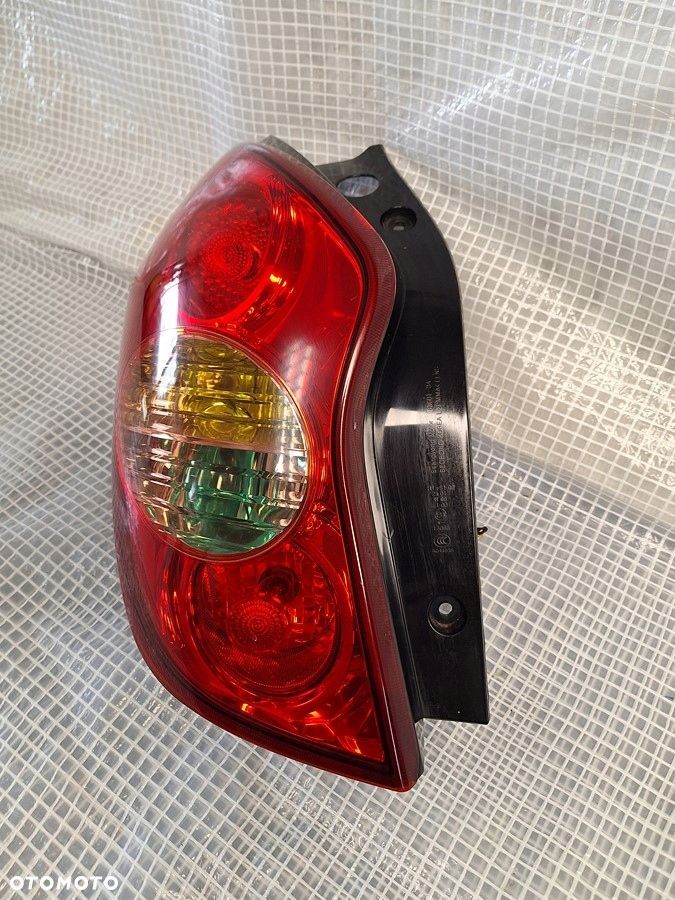 ssangyong korando III  2010- lampa tyl tylna lewa europa orgina . demont - 4