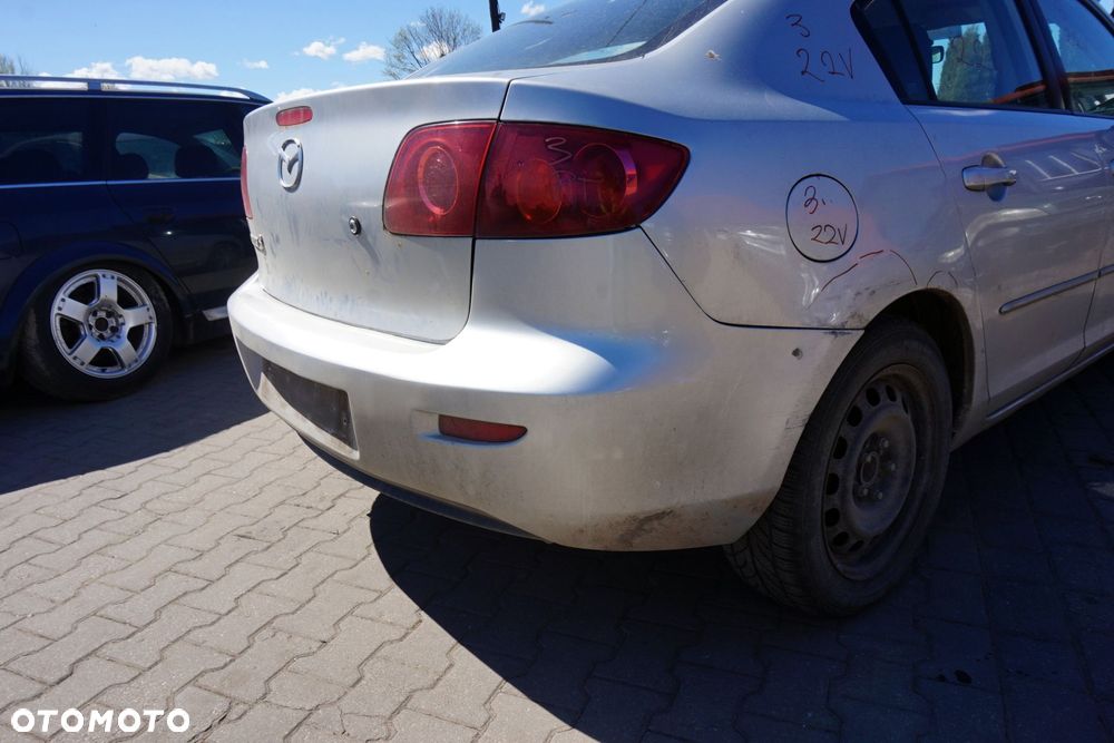 ZDERZAK TYLNY 3 I BK SEDAN 22V  SREBRNY MAZDA 2003-2006 - 2