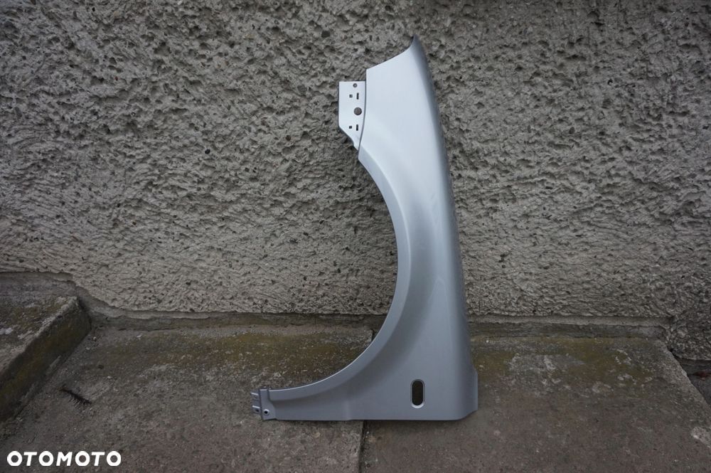 BŁOTNIK PRZÓD LEWY VW PASSAT B5 LIFT 00/03r LA7W - 2