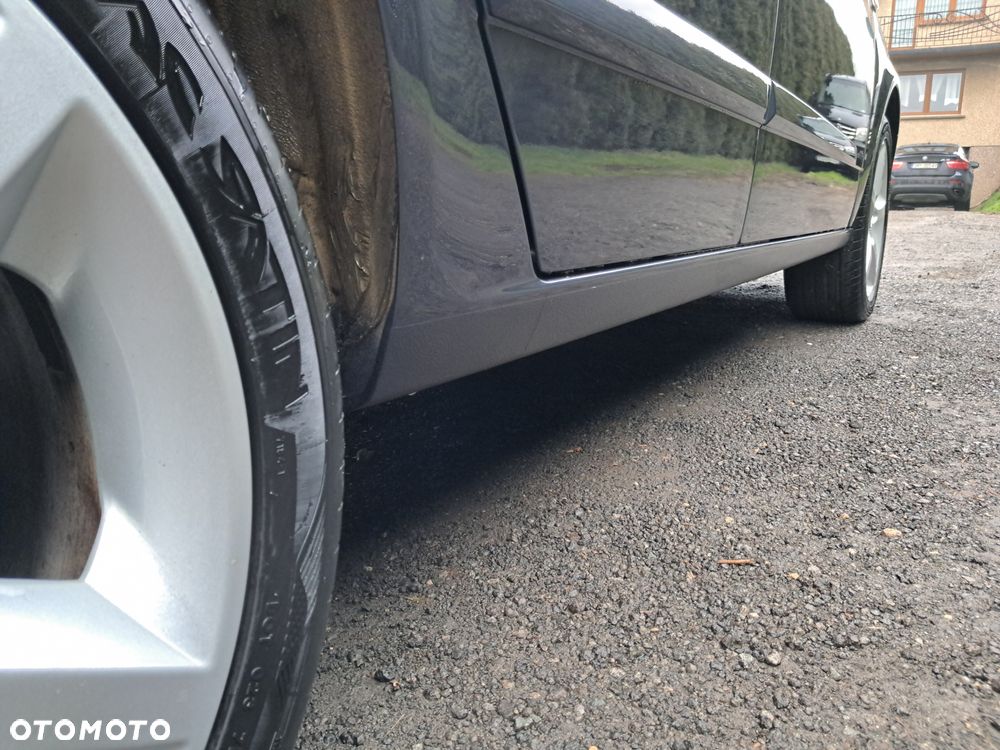 Opel Astra 1.8 Sport - 16