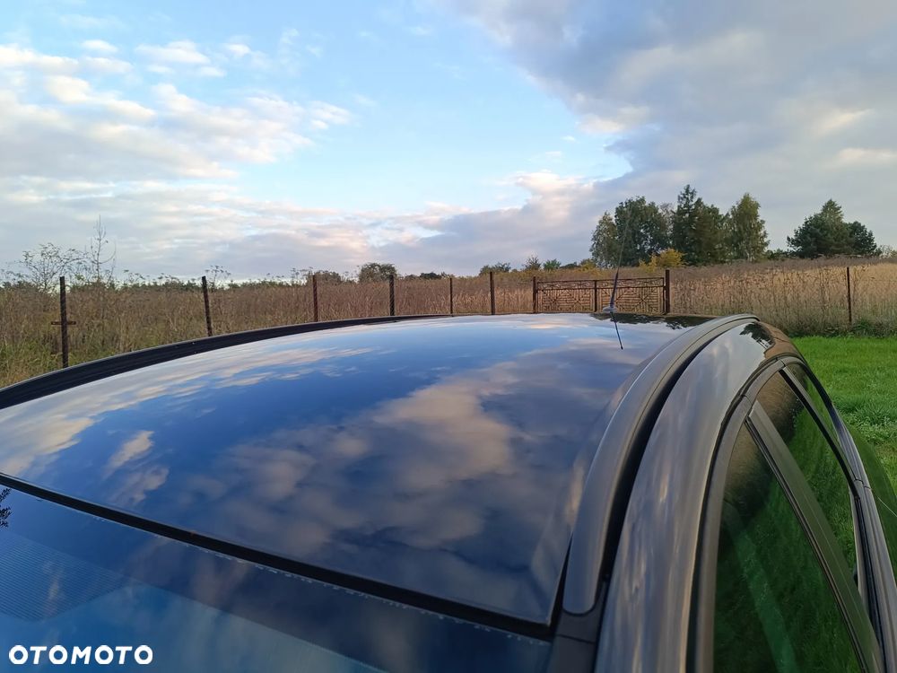 Opel Astra IV 1.4 T Cosmo - 23