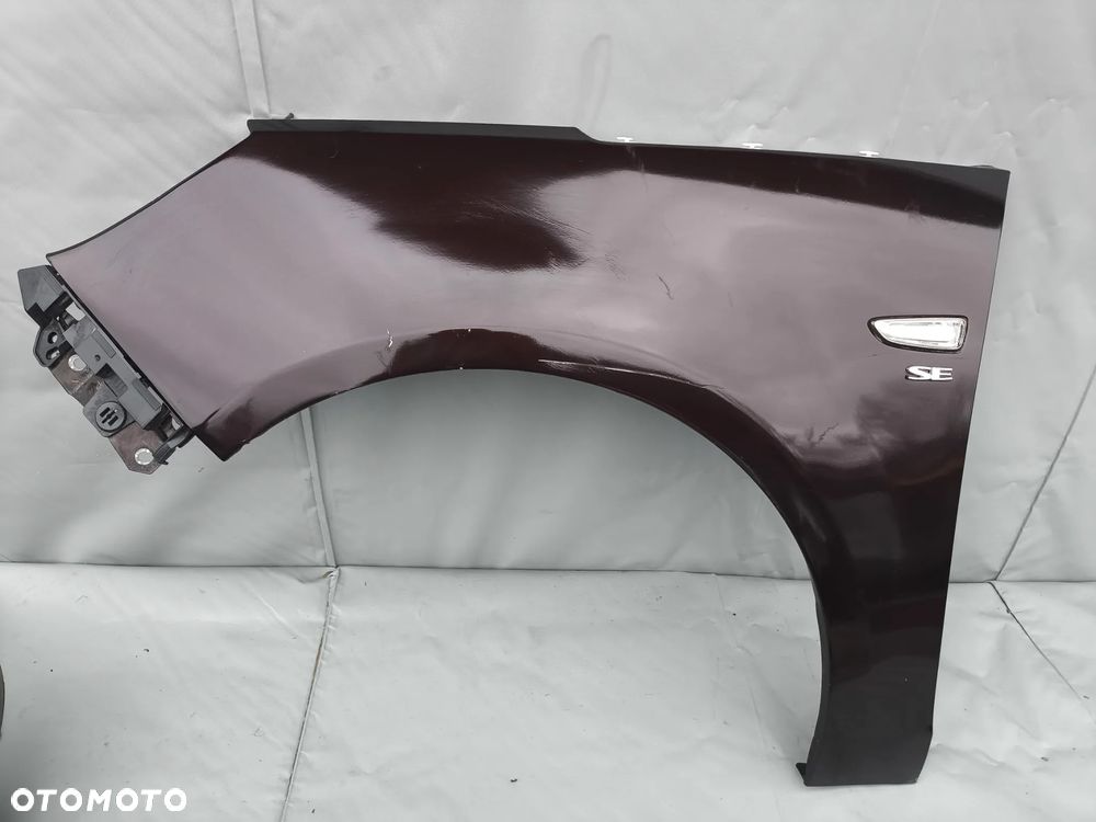 OPEL ZAFIRA C BŁOTNIK LEWY PRZEDNI