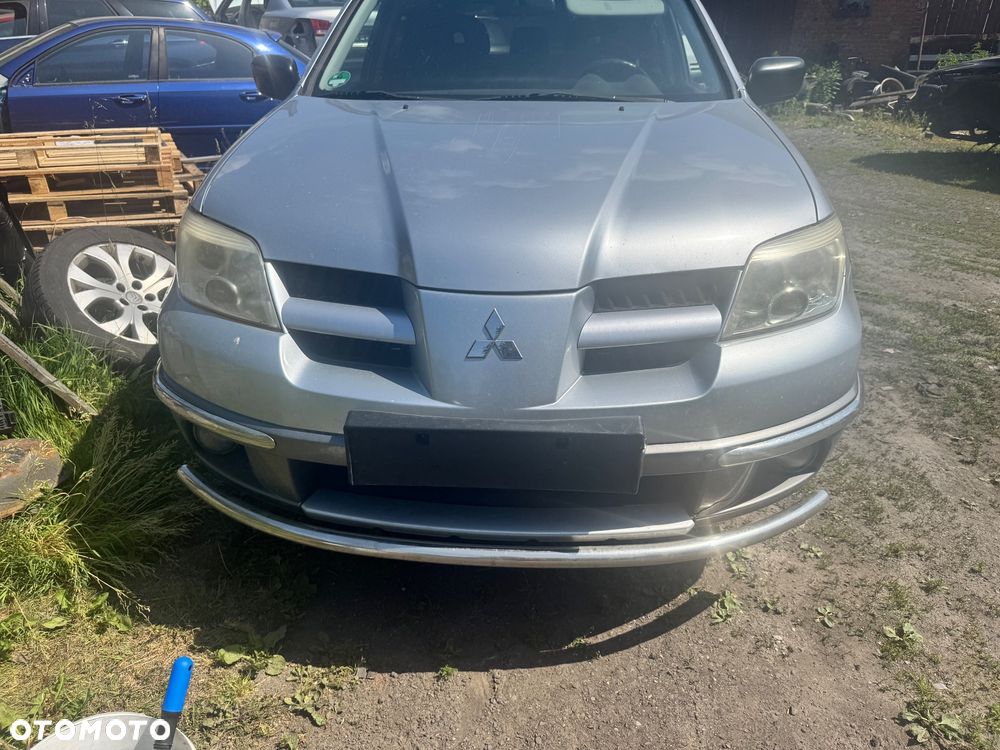 MITSUBISHI OUTLANDER I 01-06 MASKA ZDERZAK LAMPA BŁOTNIK PRZEDNI PAS CHŁODNICA KOLOR A31 - 1