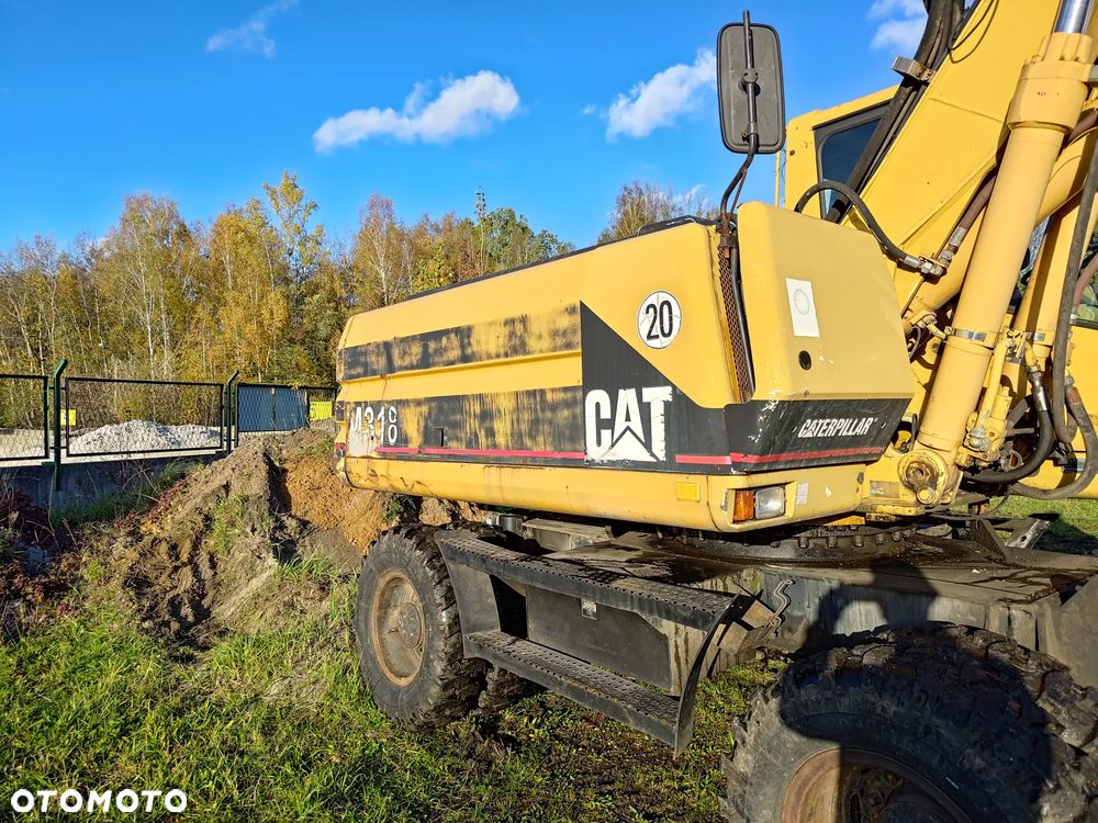 Caterpillar M318 - 12