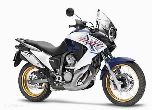 HONDA TRANALP 700 reflektor lampa czasza owiewka wypełnienie licznik błotnik kierownica lusterko manetka felga tarcza zacisk pompa zawieszenie silnik moduł regulator zbiornik siedzenie set podnóżek stelaż stopka chłodnica tłumik - 1