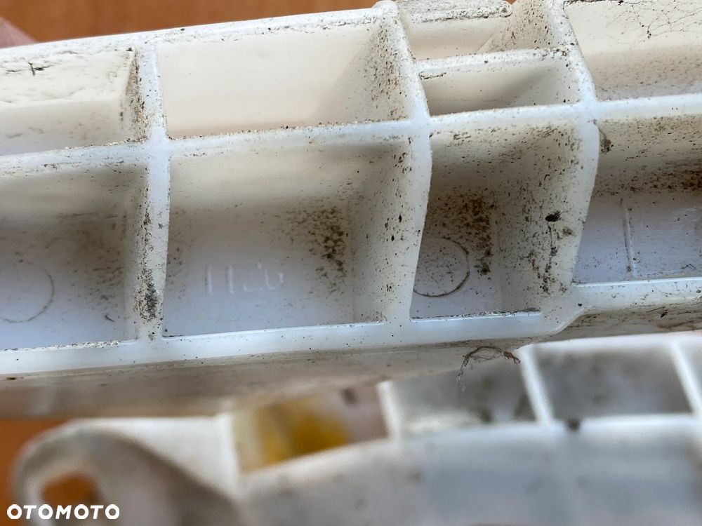 ŚLIZG MOCOWANIE ZDERZAKA LEWY PRAWY PRZÓD MITSUBISHI L200 - 4