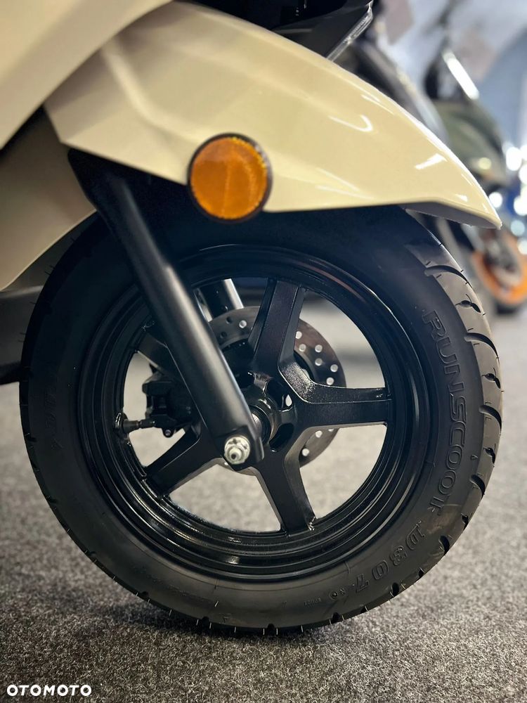 Suzuki Burgman - 5