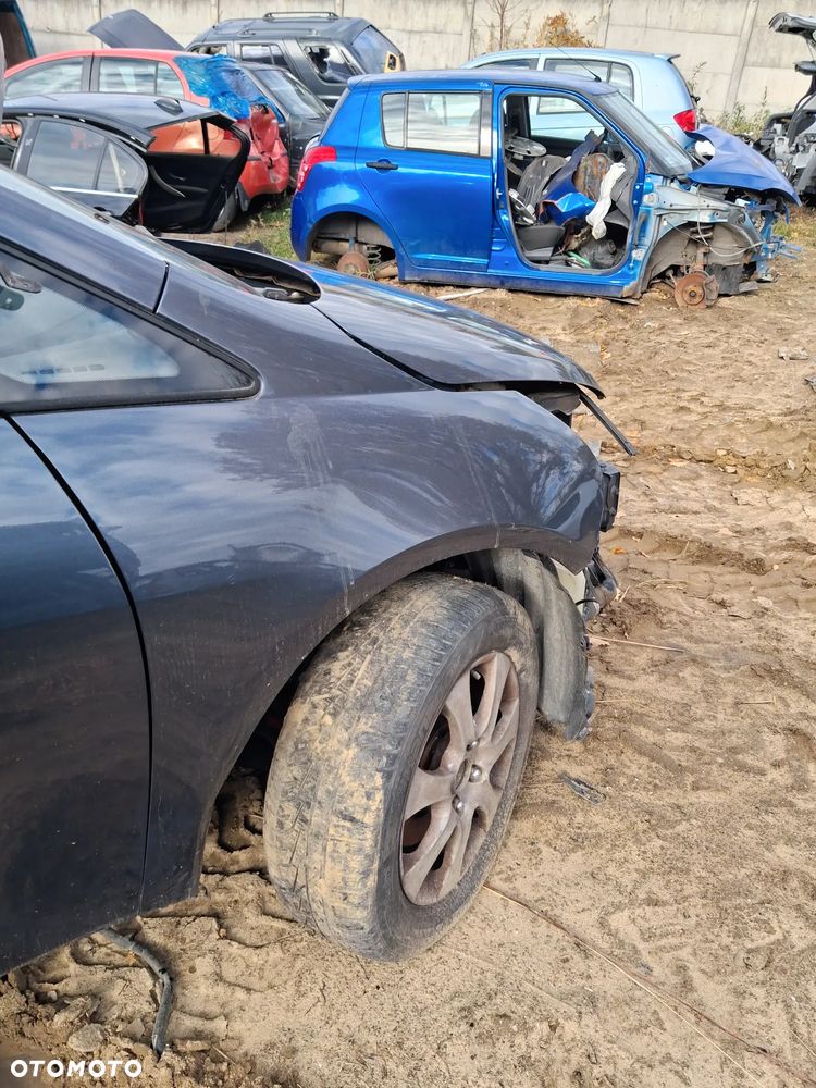 Mitsubishi grandis 06 blotnik prawy A72A - 3