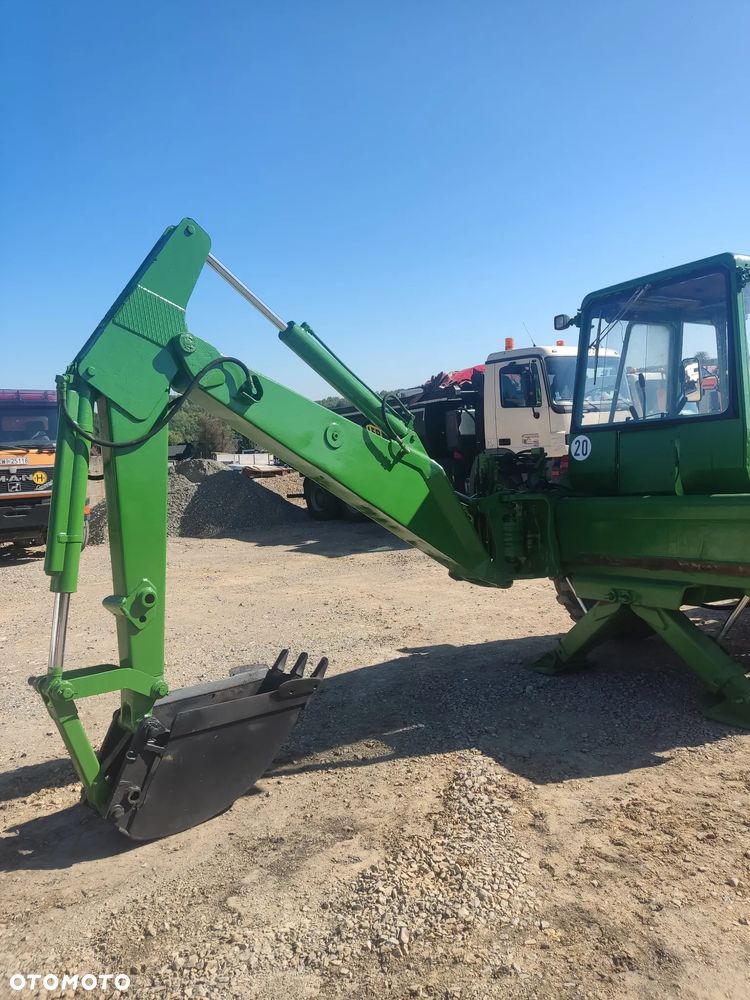 koparko ładowarka John Deere - 4