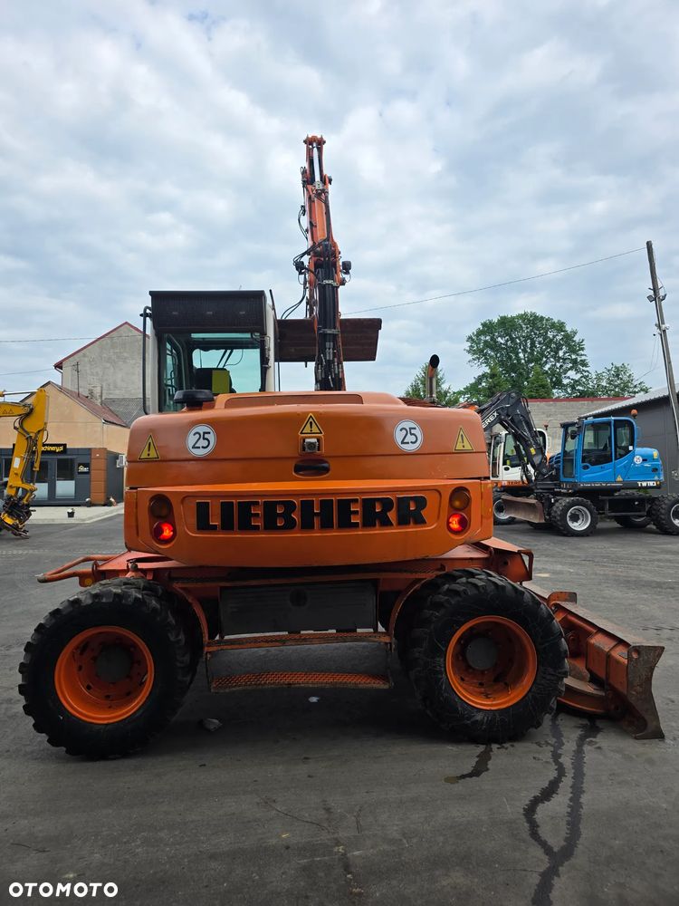 Liebherr A309 Litronic - 13