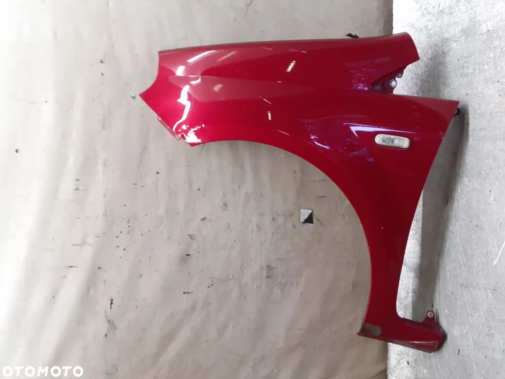 BŁOTNIK PRZÓD PRZEDNI LEWY FIAT GRANDE PUNTO 153/A BORDOWY - 1