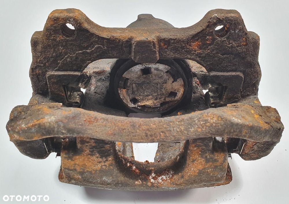 ZACISK HAMULCOWY LEWY PRZÓD FIAT FIORINO 1.3 JTD - 4