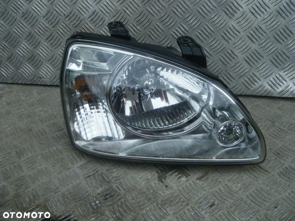 LAMPA PRZÓD PRAWA KIA CARENS EUROPA EU =RADOM