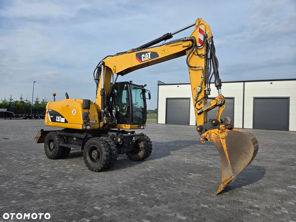Caterpillar M313D / z Niemiec / - 5