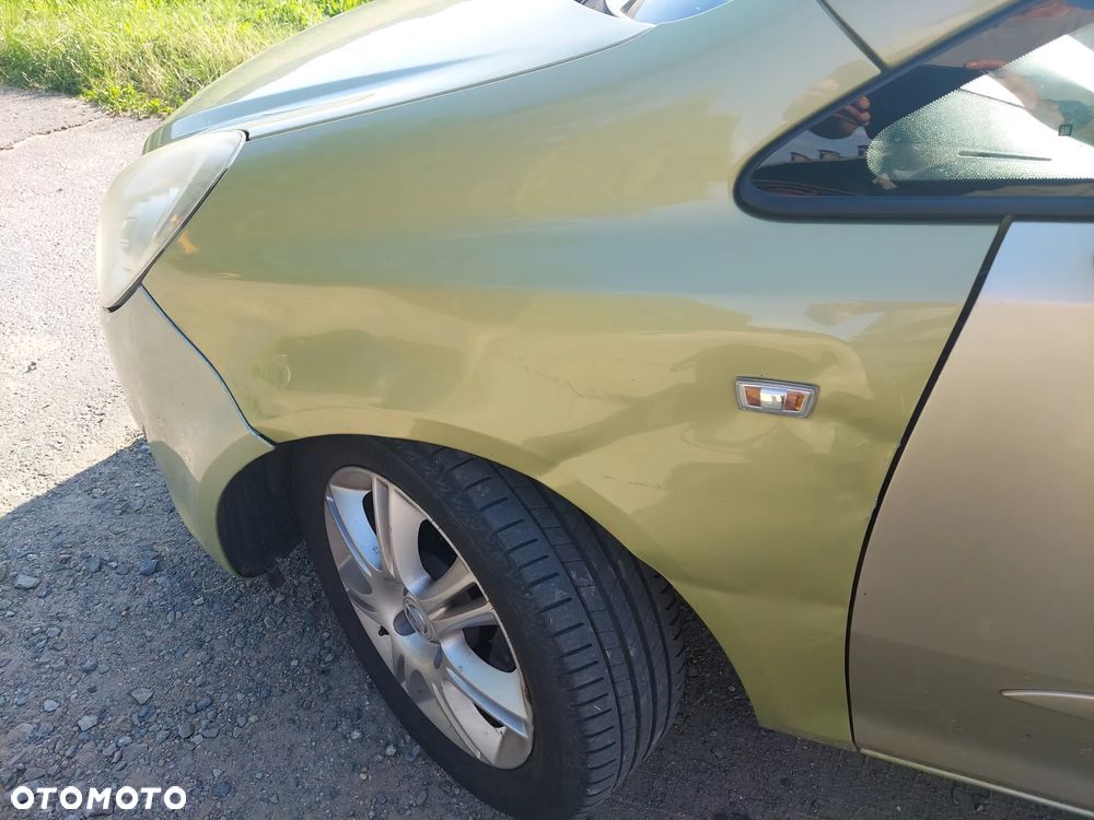 Opel Corsa 1.2 16V Enjoy - 12