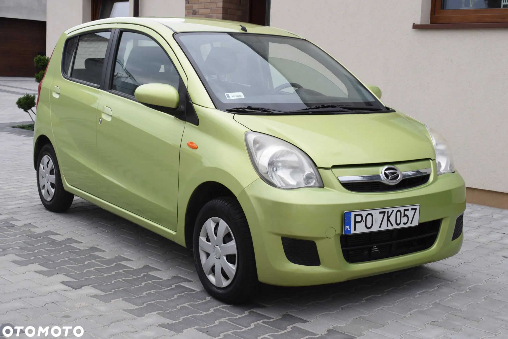 Daihatsu Cuore 1.0 Top - 1