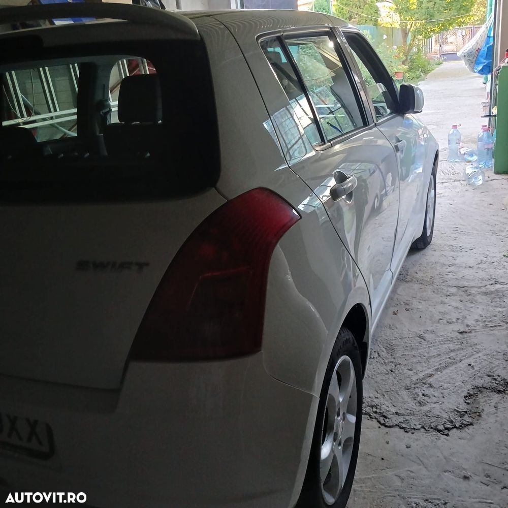 Suzuki Swift 1.3 Club - 5